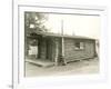 Side View of a Log Cabin Home-null-Framed Photo