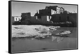 Side View Of Adobe House With Water In Foreground" Acoma Pueblo [NHL New Mexico]." 1933-1942-Ansel Adams-Framed Stretched Canvas