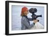 Side View of Model Holding a Movie Camera, Filming in Paradise Island, Bahamas-Gianni Penati-Framed Premium Giclee Print