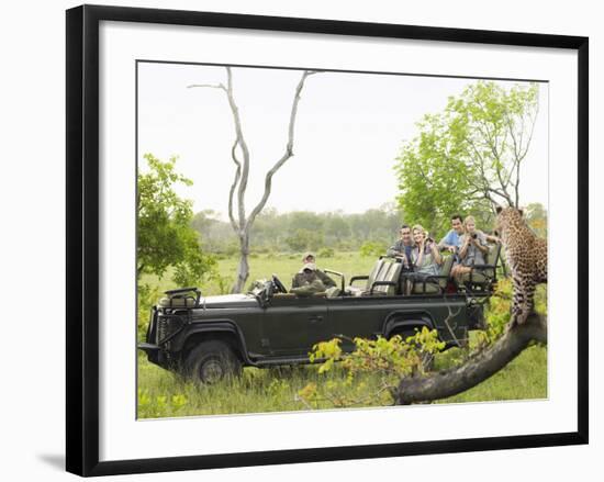 Side View of Tourists in Jeep Looking at Cheetah Lying on Log-Nosnibor137-Framed Photographic Print