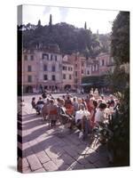 Sidewalk Cafe Sitters Taking in the Evening Sun at Portofino, Italy-Ralph Crane-Stretched Canvas