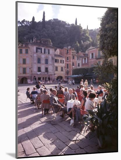 Sidewalk Cafe Sitters Taking in the Evening Sun at Portofino, Italy-Ralph Crane-Mounted Photographic Print