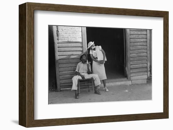 Sidewalk scene in Alabama, 1936-Walker Evans-Framed Photographic Print