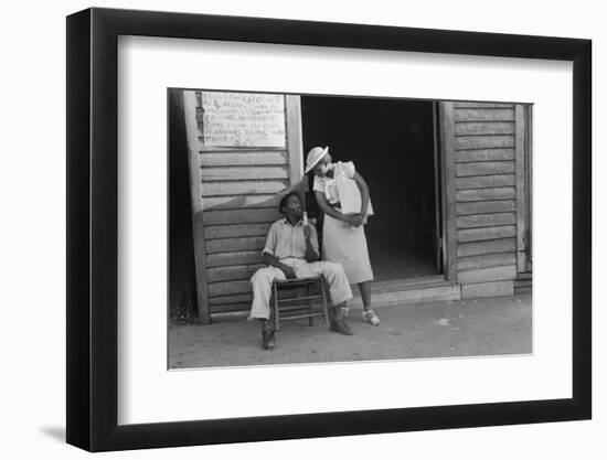 Sidewalk scene in Alabama, 1936-Walker Evans-Framed Photographic Print