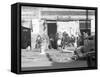 Sidewalk scene in Selma, Alabama, 1935-Walker Evans-Framed Stretched Canvas