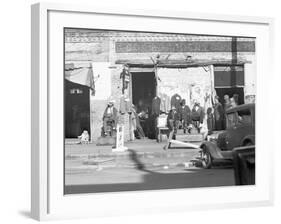 Sidewalk scene in Selma, Alabama, 1935-Walker Evans-Framed Photographic Print