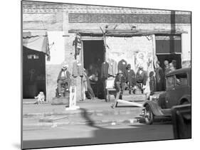 Sidewalk scene in Selma, Alabama, 1935-Walker Evans-Mounted Photographic Print