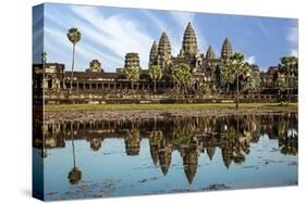 Siem Reap, Cambodia. Ancient ruins and towers of the Bayon Temple Angkor Wat-Miva Stock-Stretched Canvas