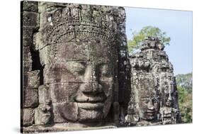 Siem Reap, Cambodia. Ancient ruins and towers of the Bayon Temple in Angkor Thom-Miva Stock-Stretched Canvas