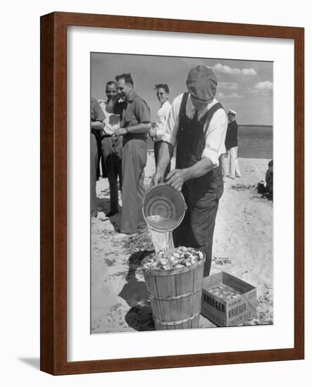 Sights of a Typical Summer at Cape Cod: Watering Clams to Aid the Steaming for Clambake-null-Framed Photographic Print