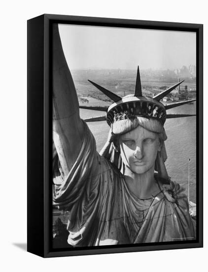 Sightseers Hanging Out Windows in Crown of Statue of Liberty with NJ Shore in the Background-Margaret Bourke-White-Framed Stretched Canvas