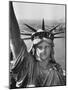 Sightseers Hanging Out Windows in Crown of Statue of Liberty with NJ Shore in the Background-Margaret Bourke-White-Mounted Photographic Print