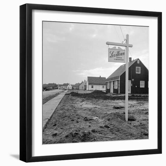 Sign Declaring the Area as Levittown Outside Newly Constructed Homes-null-Framed Photographic Print