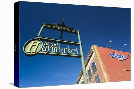 Sign for the Haymarket District, Lincoln, Nebraska, USA-Walter Bibikow-Stretched Canvas
