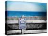 Sign Indicating Distance from Nantucket Island to Spain.-Sabine Jacobs-Stretched Canvas