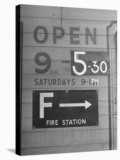 Sign Repainted to Show Earlier Closing Time For a Business Due to Mandatory Blackout in Evening-David Scherman-Stretched Canvas