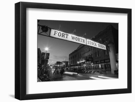 Signboard over a road at dusk, Fort Worth Stockyards, Fort Worth, Texas, USA-null-Framed Photographic Print