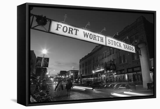 Signboard over a road at dusk, Fort Worth Stockyards, Fort Worth, Texas, USA-null-Framed Stretched Canvas