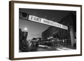 Signboard over a road at dusk, Fort Worth Stockyards, Fort Worth, Texas, USA-null-Framed Photographic Print