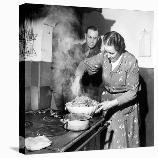 Signora Socci Cooking Spaghetti Dinner for American Sergeant Alexander before He Leaves-John Phillips-Stretched Canvas