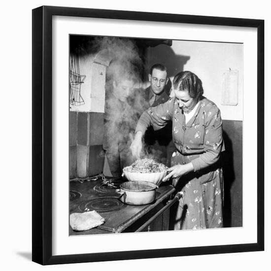 Signora Socci Cooking Spaghetti Dinner for American Sergeant Alexander before He Leaves-John Phillips-Framed Premium Photographic Print