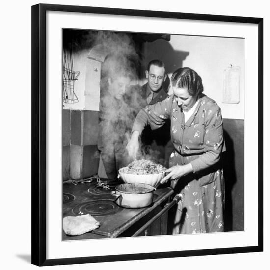 Signora Socci Cooking Spaghetti Dinner for American Sergeant Alexander before He Leaves-John Phillips-Framed Premium Photographic Print