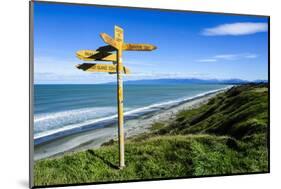 Signpost on Te Waewae Bay, Along the Road from Invercargill to Te Anau, South Island-Michael Runkel-Mounted Photographic Print