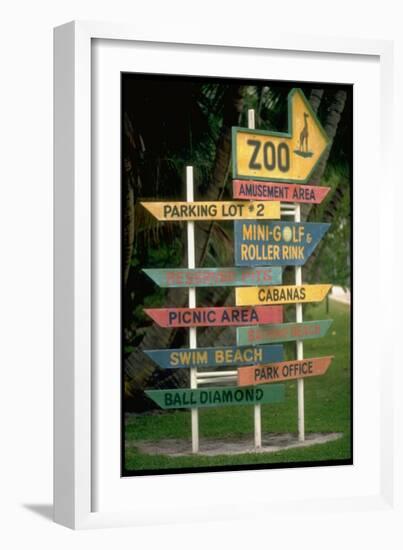 Signs Pointing Every Which Way, Key Biscayne, Florida-George Silk-Framed Photographic Print