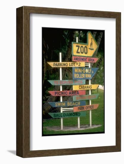 Signs Pointing Every Which Way, Key Biscayne, Florida-George Silk-Framed Photographic Print