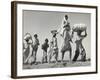 Sikh Carrying His Wife on Shoulders After the Creation of Sikh and Hindu Section of Punjab India-Margaret Bourke-White-Framed Photographic Print