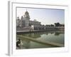 Sikh Pilgrim Bathing in the Pool of the Gurudwara Bangla Sahib Temple, Delhi, India-Eitan Simanor-Framed Photographic Print