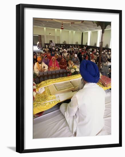 Sikh Priest and Holy Book at Sikh Wedding, London, England, United Kingdom-Charles Bowman-Framed Photographic Print