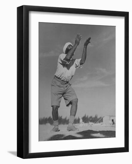 Sikh Soldiers Playing Volleyball at Indian Army Camp in the Desert Near the Great Pyramids-Margaret Bourke-White-Framed Premium Photographic Print