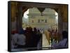 Sikhs at the Entrance to the Golden Temple, Crossing Guru's Bridge, Amritsar, Punjab, India-Jeremy Bright-Framed Stretched Canvas