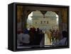 Sikhs at the Entrance to the Golden Temple, Crossing Guru's Bridge, Amritsar, Punjab, India-Jeremy Bright-Framed Stretched Canvas