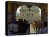 Sikhs at the Entrance to the Golden Temple, Crossing Guru's Bridge, Amritsar, Punjab, India-Jeremy Bright-Stretched Canvas