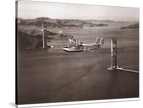 Sikorsky S-42 through the Golden Gate under Construction, San Francisco, 1935-Clyde Sunderland-Stretched Canvas