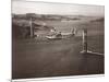 Sikorsky S-42 through the Golden Gate under Construction, San Francisco, 1935-Clyde Sunderland-Mounted Art Print