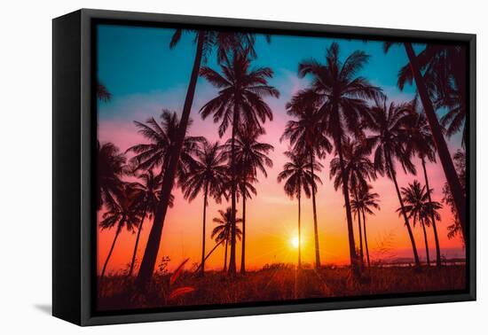 Silhouette Coconut Palm Trees on Beach at Sunset. Vintage Tone.-Nuttawut Uttamaharad-Framed Stretched Canvas