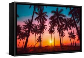 Silhouette Coconut Palm Trees on Beach at Sunset. Vintage Tone.-Nuttawut Uttamaharad-Framed Stretched Canvas