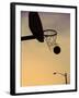 Silhouette of a Basketball Going Through a Basketball Net-null-Framed Premium Photographic Print