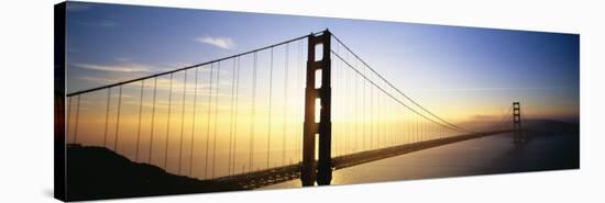 Silhouette of a Bridge at Dawn, Golden Gate Bridge, San Francisco, California, USA-null-Stretched Canvas