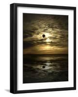 Silhouette of a Hot Air Balloon Over Water-null-Framed Photographic Print