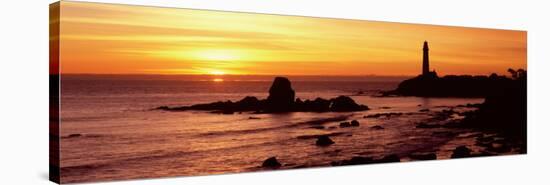 Silhouette of a Lighthouse at Sunset, Pigeon Point Lighthouse, San Mateo County, California, USA-null-Stretched Canvas