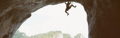 https://imgc.allpostersimages.com/img/posters/silhouette-of-a-man-climbing-a-rock-railay-beach-krabi-thailand_u-L-OKVJU0.jpg?artPerspective=n