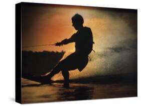 Silhouette of a Man Water Skiing-null-Stretched Canvas