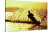 Silhouette of a man waterskiing in sea-null-Stretched Canvas