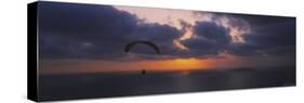 Silhouette of a Person Paragliding over the Sea, Blacks Beach, San Diego, California, USA-null-Stretched Canvas