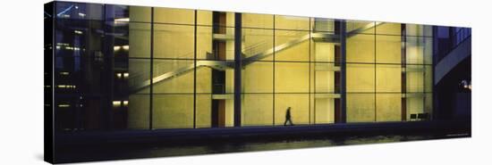 Silhouette of a Person Walking in Front of a Building, Paul Lobe Haus, Berlin, Germany-null-Stretched Canvas