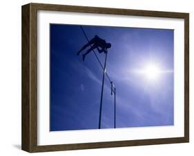 Silhouette of a Pole Vaulter in Action-null-Framed Photographic Print